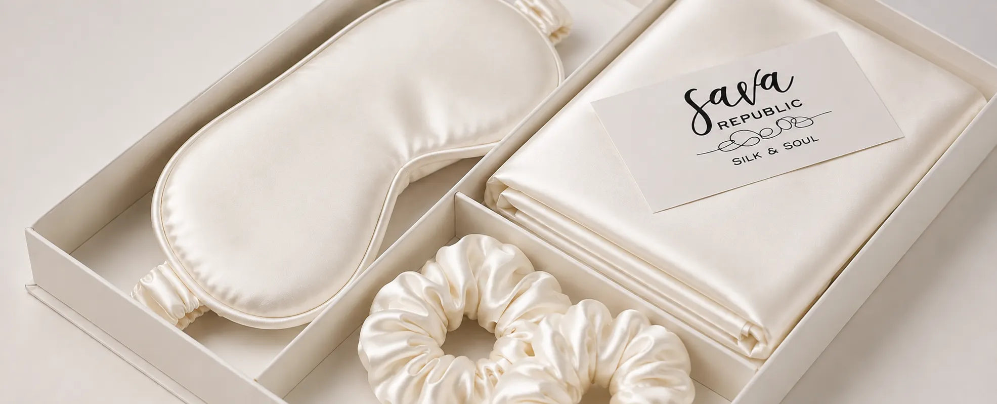Luxury Sava Republic gift box featuring a mulberry silk eye mask, silk pillowcase and pure silk scrunchies, beautifully arranged in premium gift packaging.